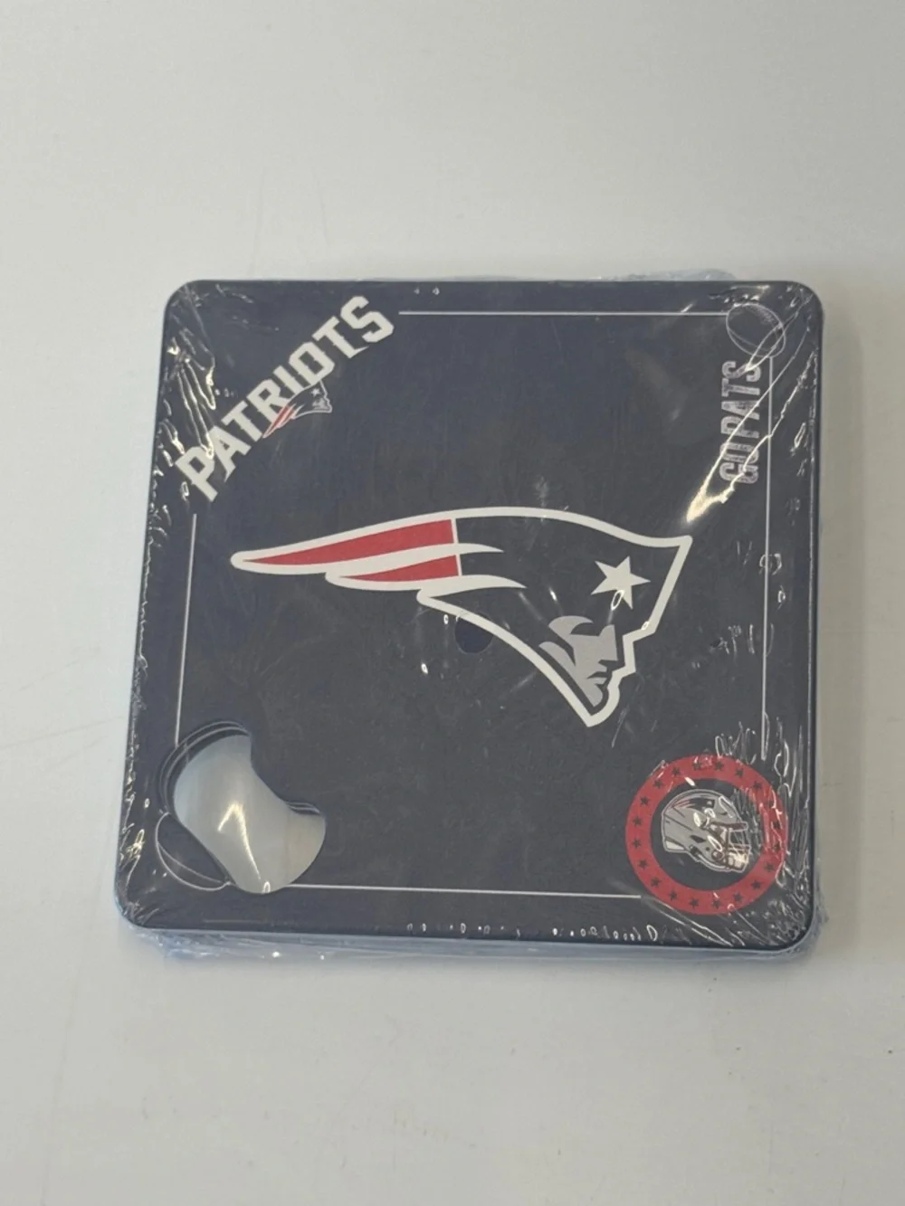 Set of 12 Metal “Patriots” Coasters with bottle opener.